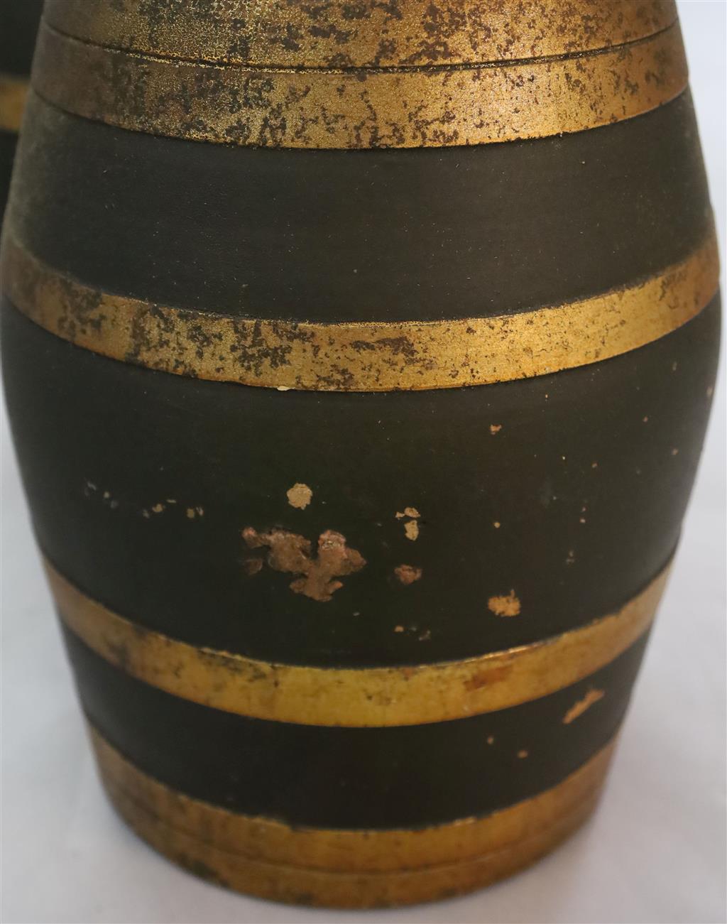 A set of four Victorian painted stoneware spirit barrels, I.Whisky, SCH.Whisky, Rum and Brandy, 14in and 11.5in.